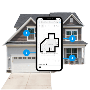 a house behind a phone showing a floor plan sketch