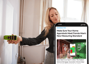Realto taking the measurements of a property with a bluetooth laser measure marking the GLA with a phone with an article on Make Sure Your Home Appraisals Meet Fannie Mae’s New Measuring Standard
