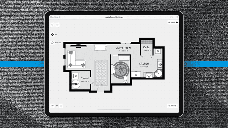 Planning a carpet restoration job using a magicplan floor plan on an ipad on a gray carpet with a blue line