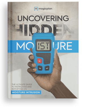 moisture intrusion guide cover with restorer holding a blue moisture mete uncovering hidden moisture