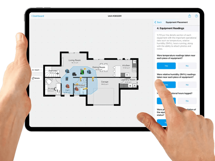 employee holding ipad filling out water damage drying equipment sop questionnaire checlikst on the magicplan app custom form